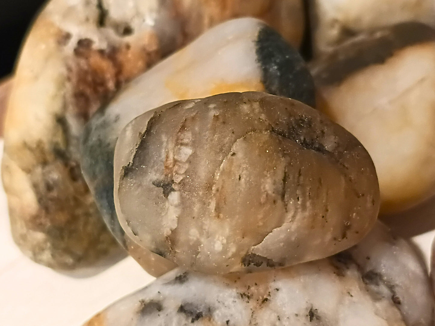 Plymouth beach stone with iron oxide weathering detail