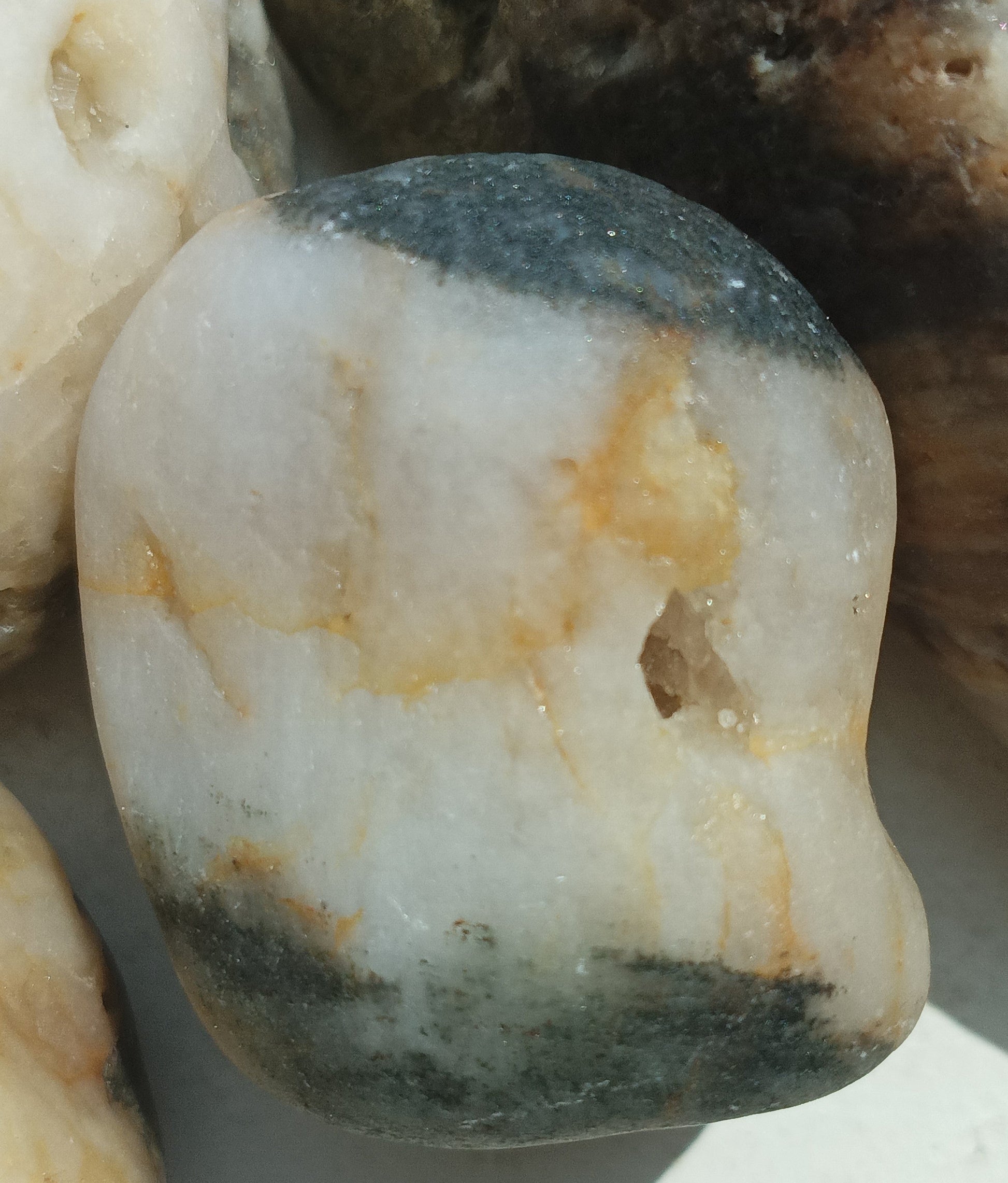 Plymouth beach stones grouped showing variety of patterns
